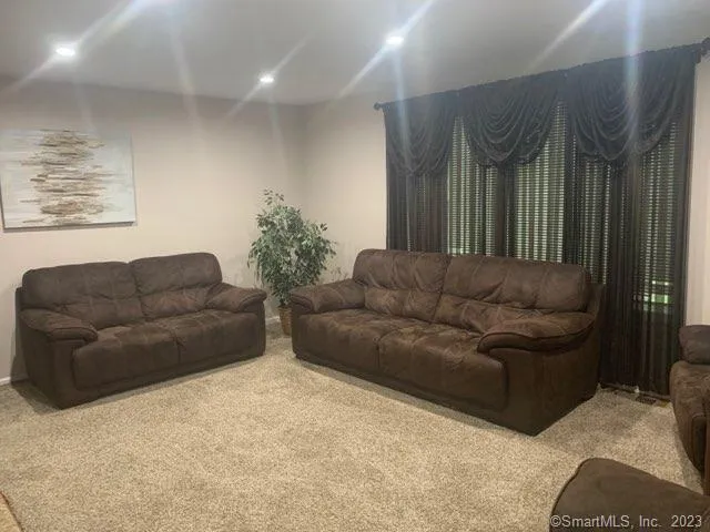 a living room with fireplace
