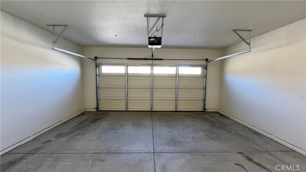 20125 Zuni Road Apple Valley, CA 92307 - Photo 18 of 19 a view of a garage