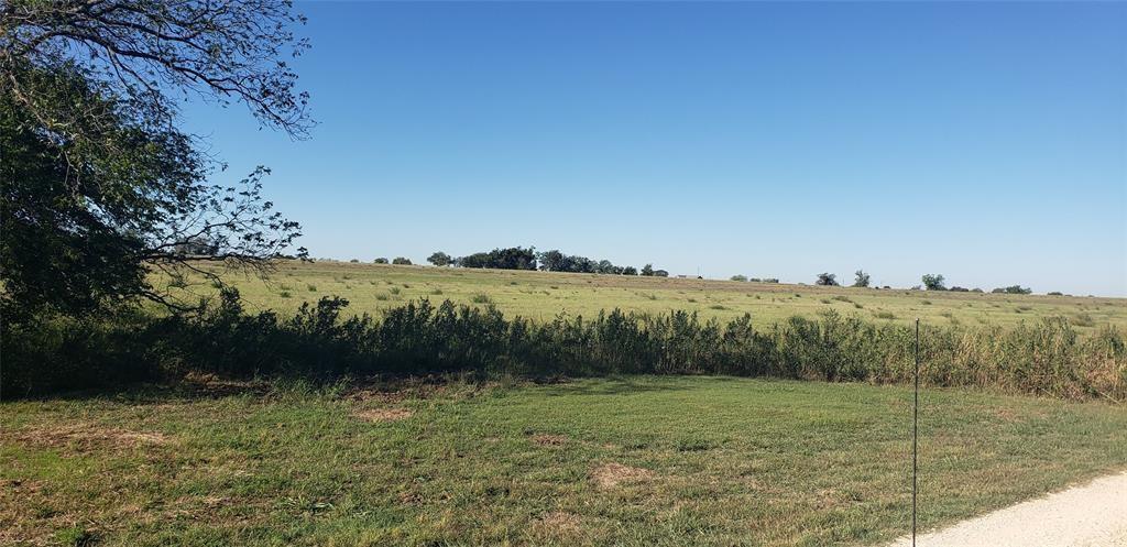 2 County Road 440 Thorndale, TX 76577 - Photo 18 of 29 a view of lake with mountain in background