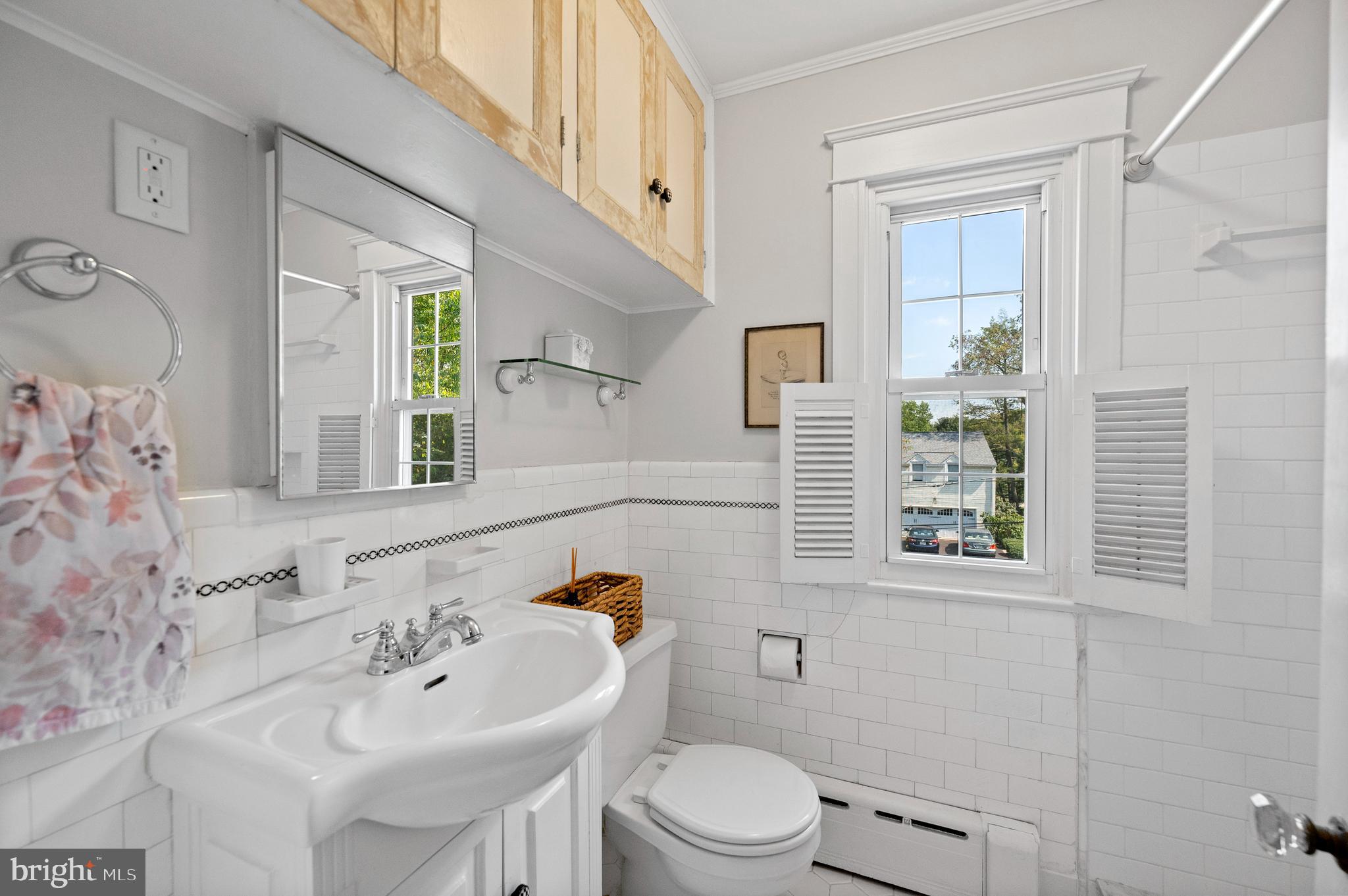 232 Walnut Road Wayne, PA 19087 - Photo 18 of 35 Updated Primary Bath w/ White Tile & Stall Shower