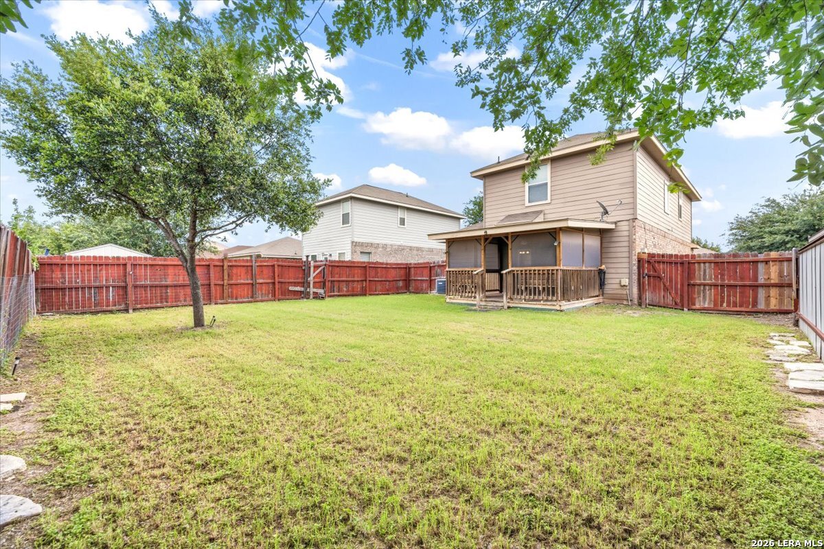 3831 Bacall Way Converse, TX 78109 - Photo 31 of 33 a view of a house with a backyard