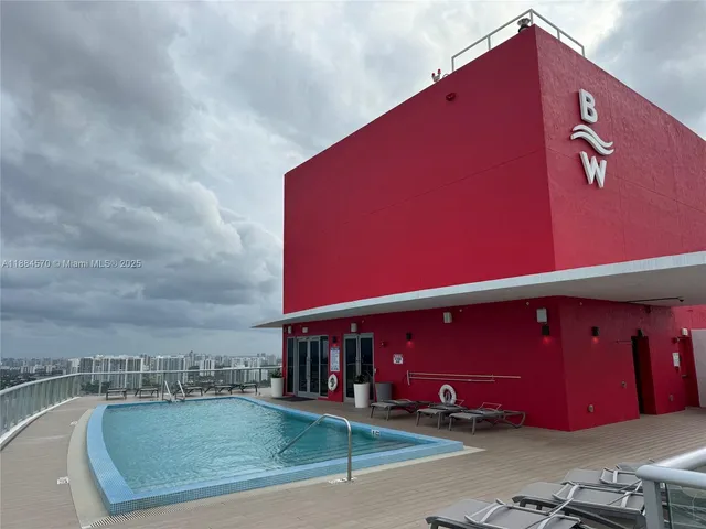 a view of a building with a street