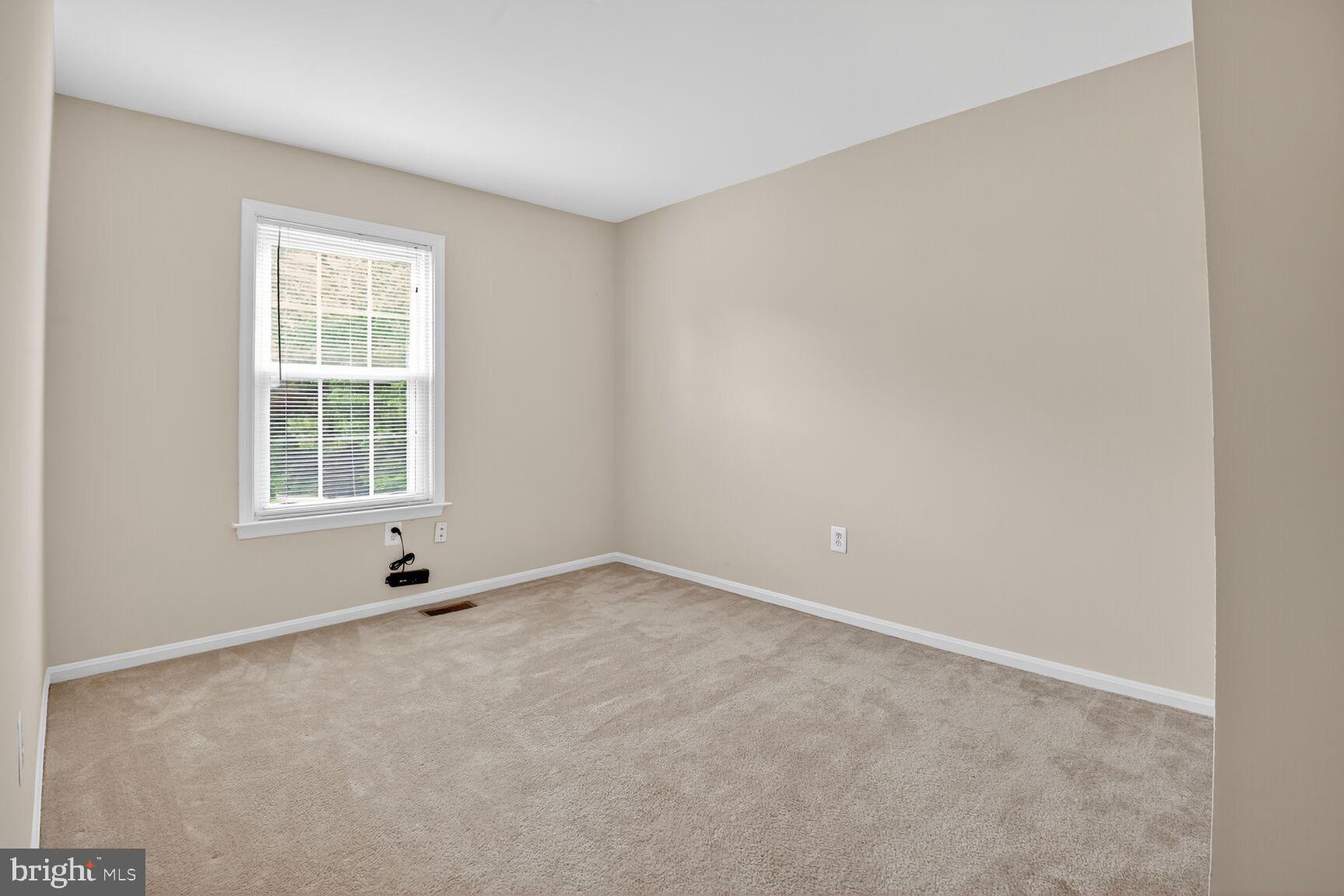 3423 Tendril Court Woodbridge, VA 22192 - Photo 16 of 20 an empty room with windows