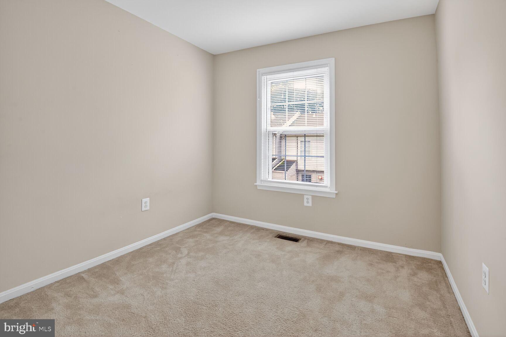 3423 Tendril Court Woodbridge, VA 22192 - Photo 17 of 20 an empty room with windows