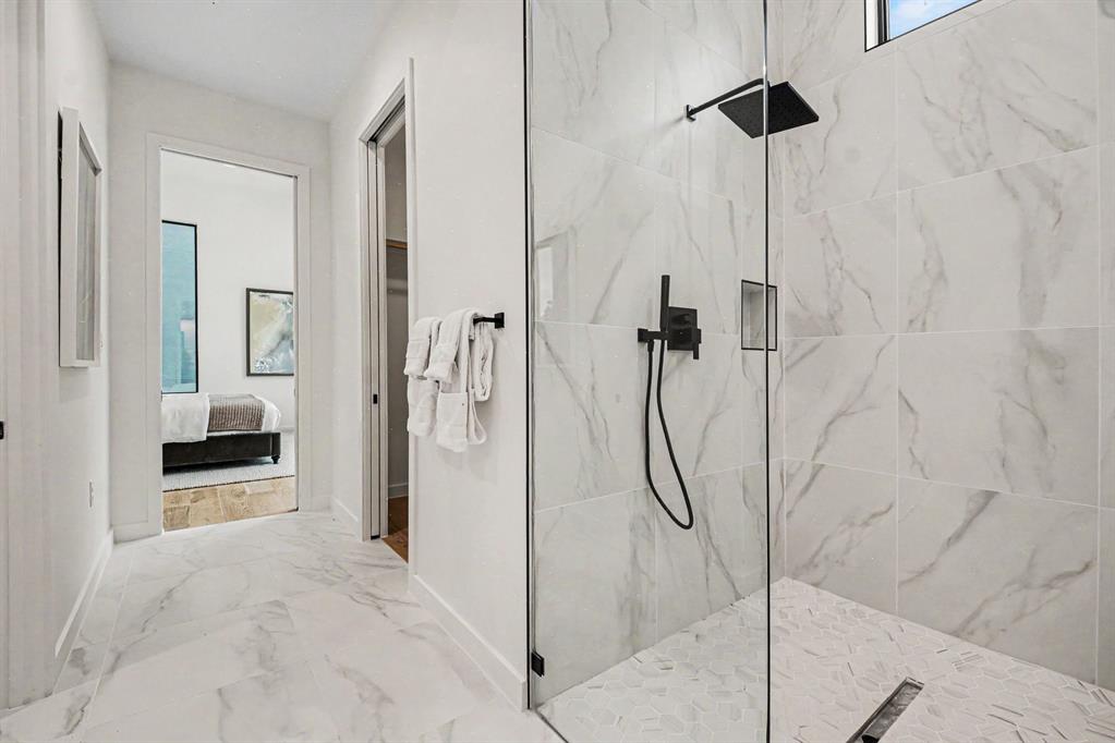 1111 Raiford Road, Unit 121 Carrollton, TX 75007 - Photo 14 of 30 a bathroom with a shower