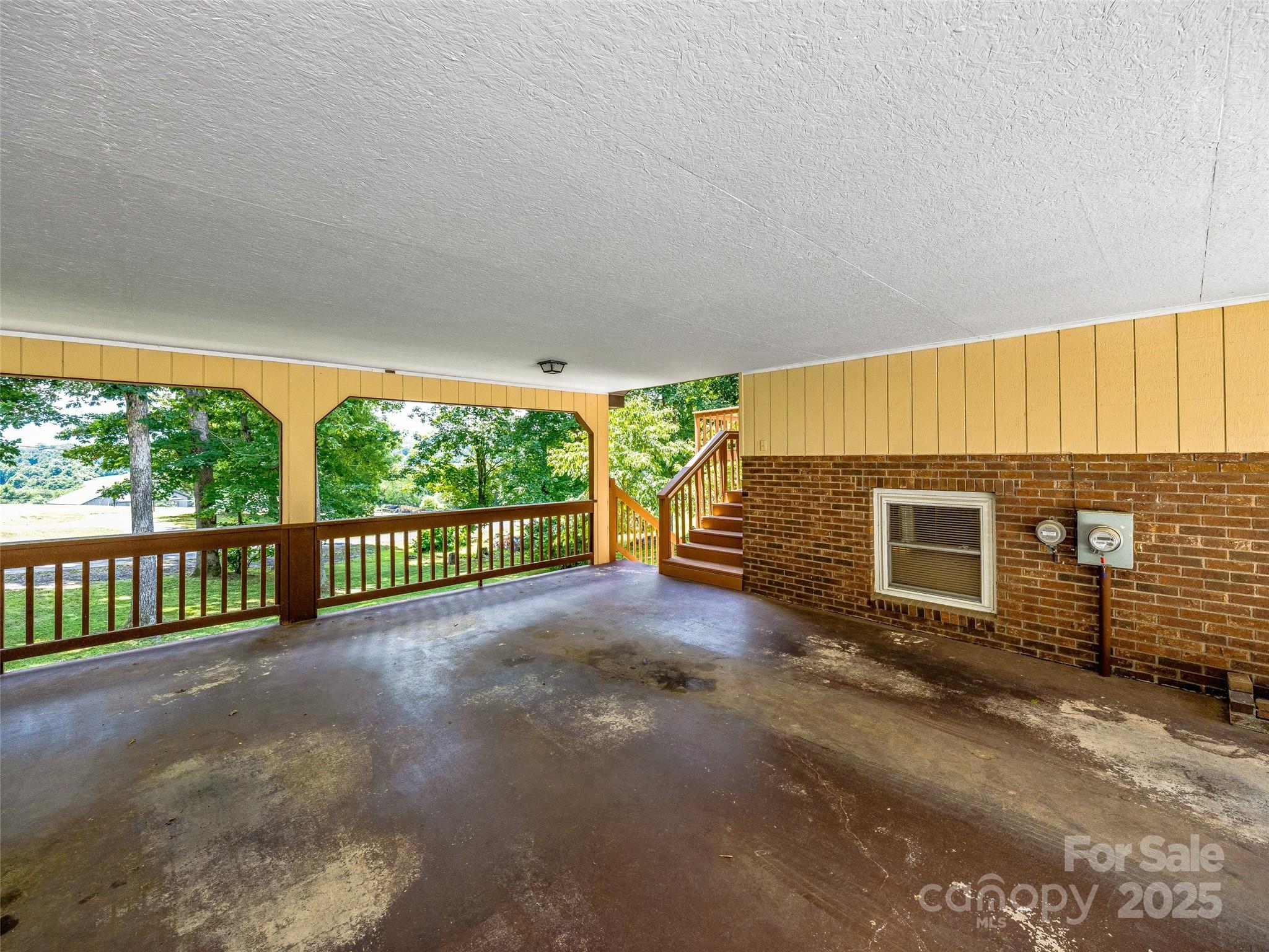 29 Tall Oaks Road Candler, NC 28715 - Photo 31 of 34 a view of a porch with a yard