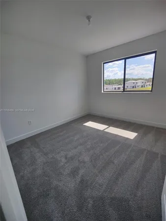 an empty room with window