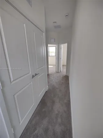 en empty room with windows