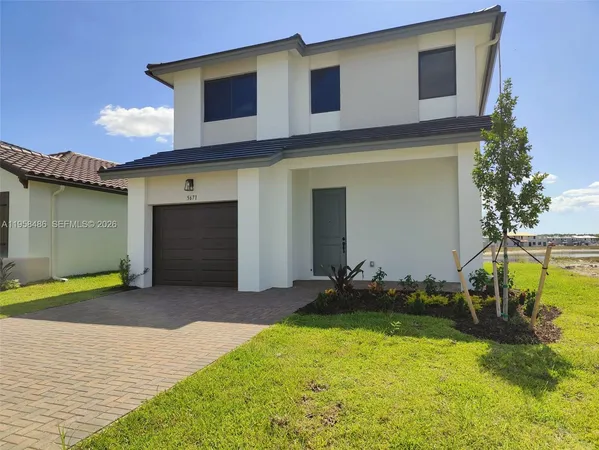 a front view of house with yard