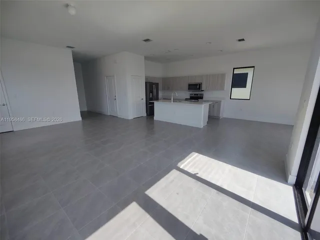 a house view with a garden space