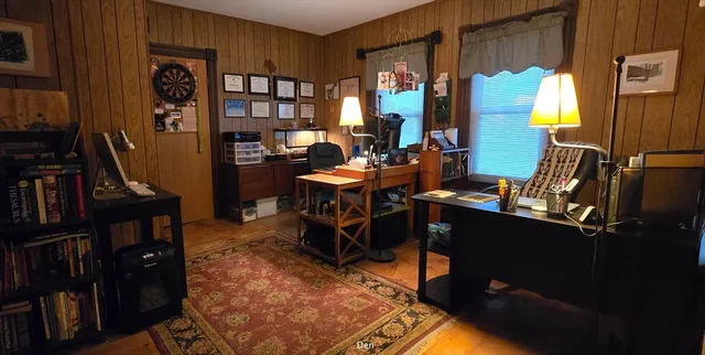 a view of a workspace with furniture