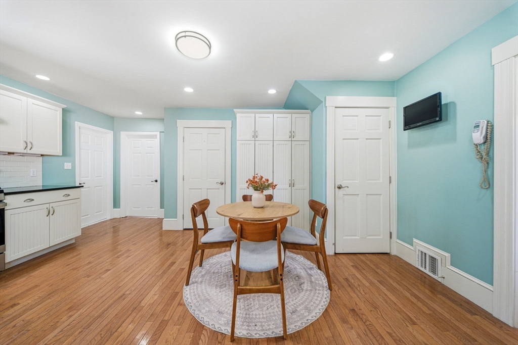 45 Marion Street Natick, MA 01760 - Photo 21 of 42 a living room with furniture and a wooden floor