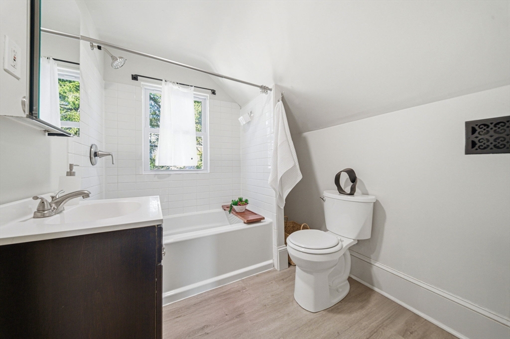 45 Marion Street Natick, MA 01760 - Photo 27 of 42 a bathroom with a sink toilet and a mirror