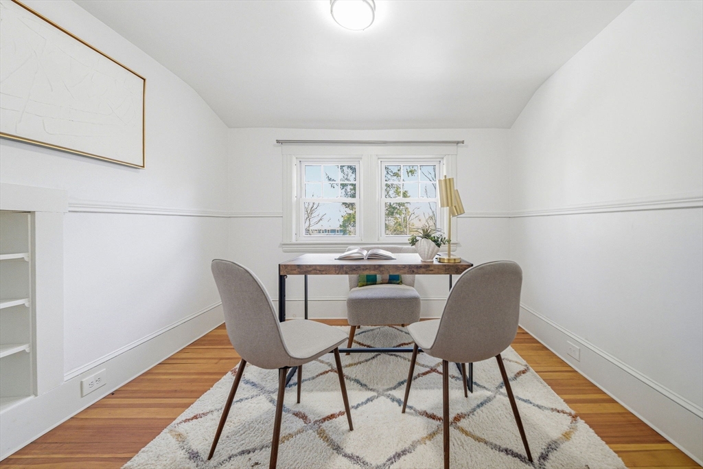 45 Marion Street Natick, MA 01760 - Photo 32 of 42 a view of a dining room with furniture and wooden floor
