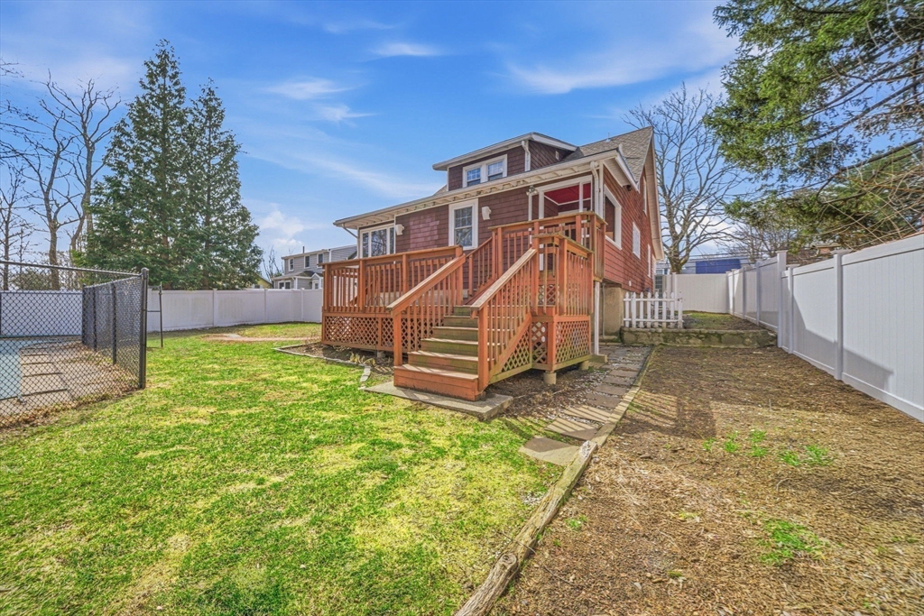 45 Marion Street Natick, MA 01760 - Photo 41 of 42 a view of a house with a yard