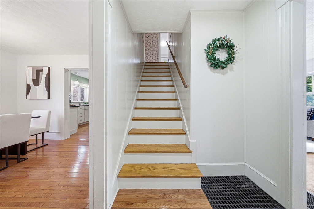 45 Marion Street Natick, MA 01760 - Photo 7 of 42 a view of entryway and hall with wooden floor