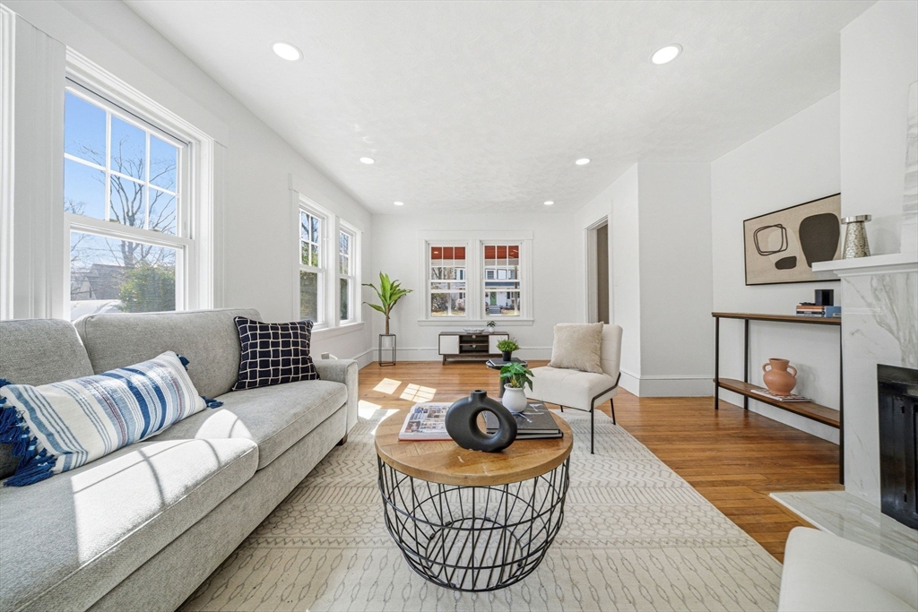 45 Marion Street Natick, MA 01760 - Photo 10 of 42 a living room with furniture and a table