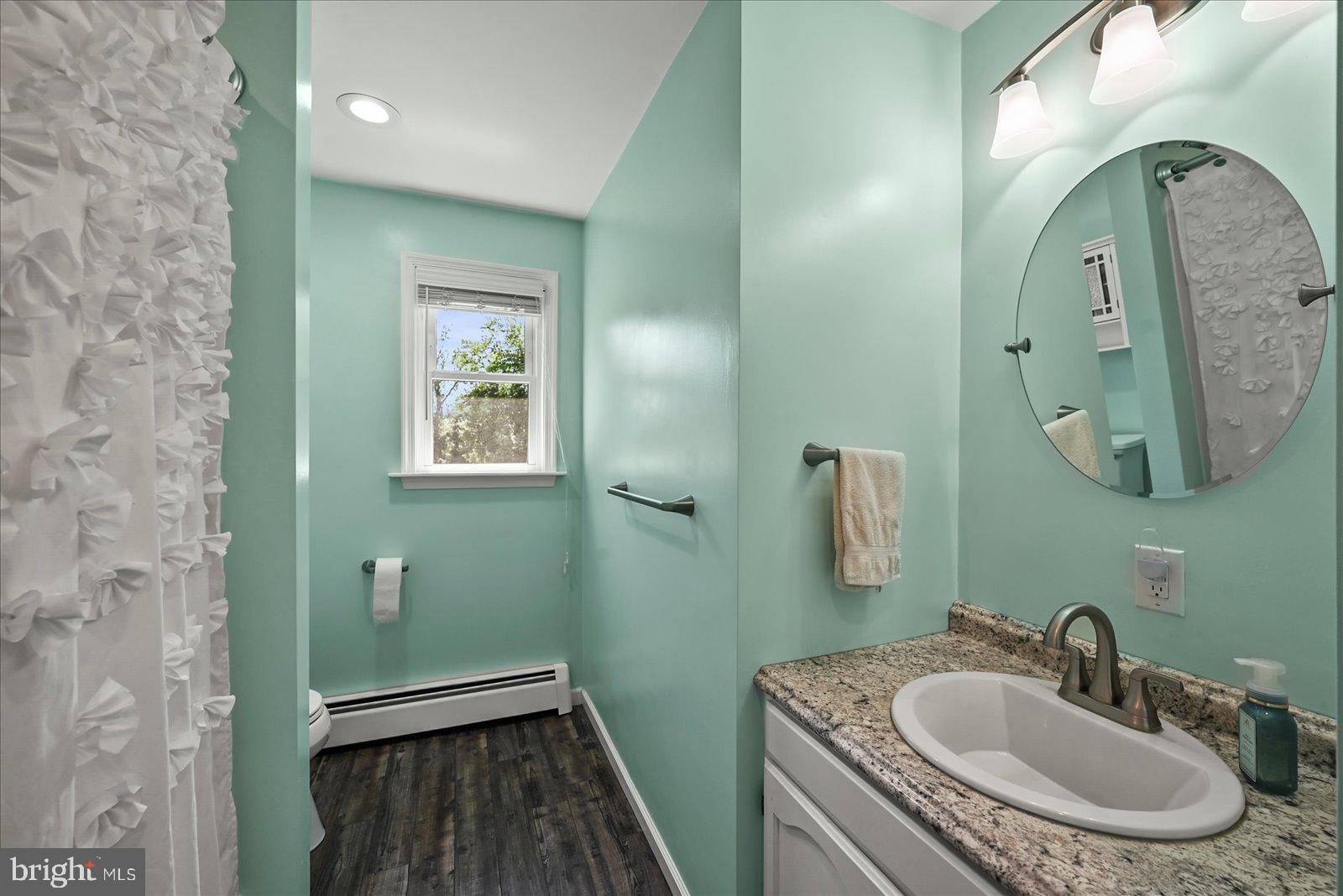 253 Kindig Road Littlestown, PA 17340 - Photo 13 of 41 Serene mint green bathroom retreat.