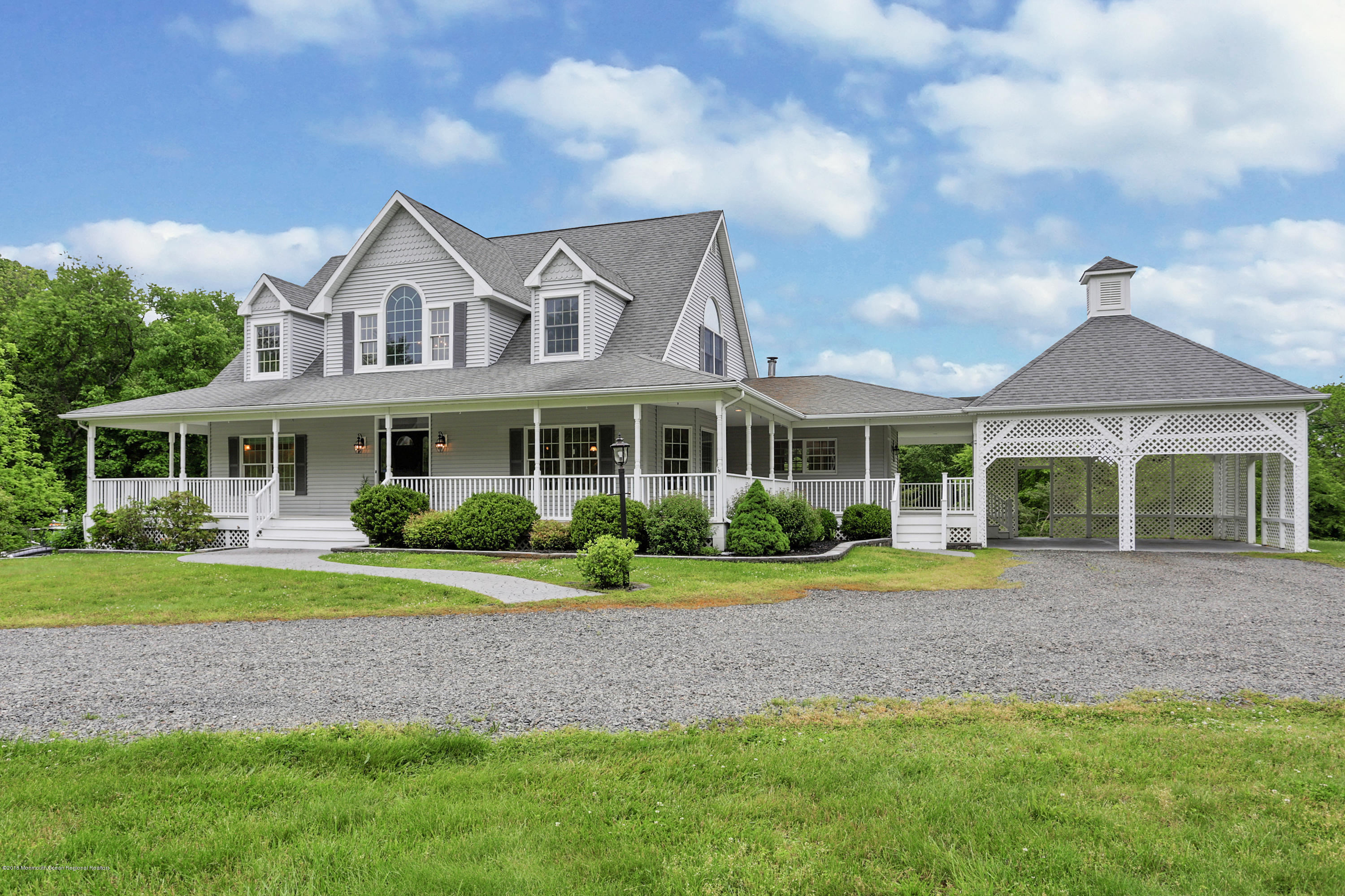 154 Lemon Road Farmingdale, NJ 07727 - Photo 3 of 43 a front view of a house with a yard
