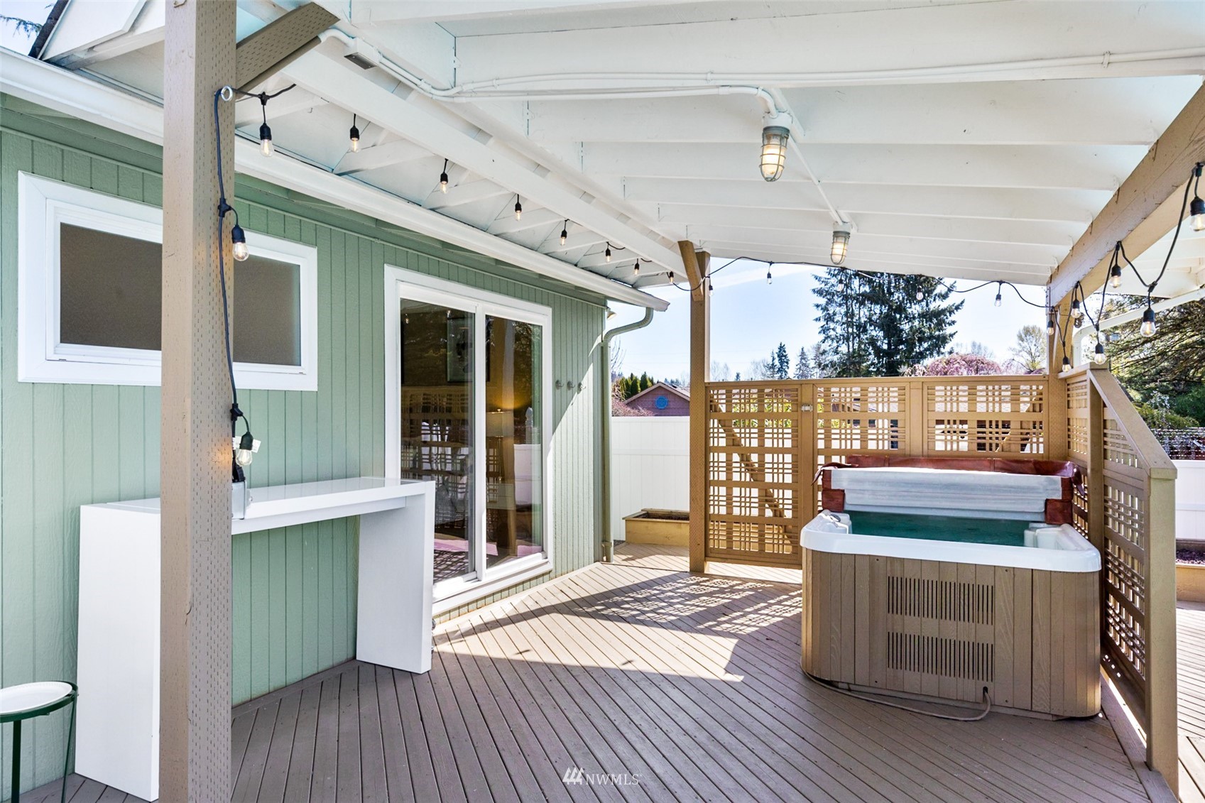 24204 Lockwood Road Bothell, WA 98021 - Photo 24 of 40 a room with lots of wooden furniture and wooden floors