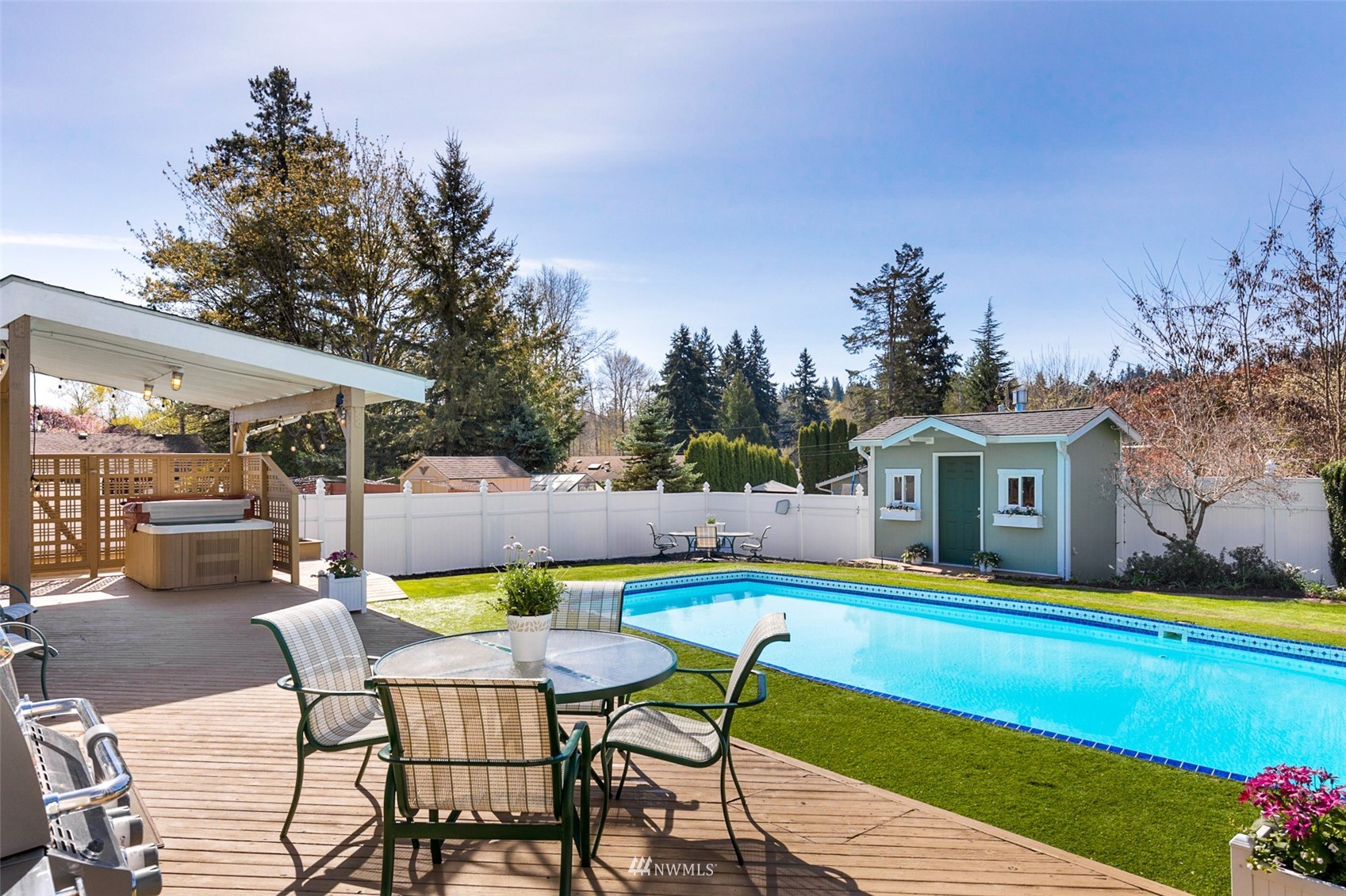24204 Lockwood Road Bothell, WA 98021 - Photo 28 of 40 a view of house with swimming pool yard and outdoor seating