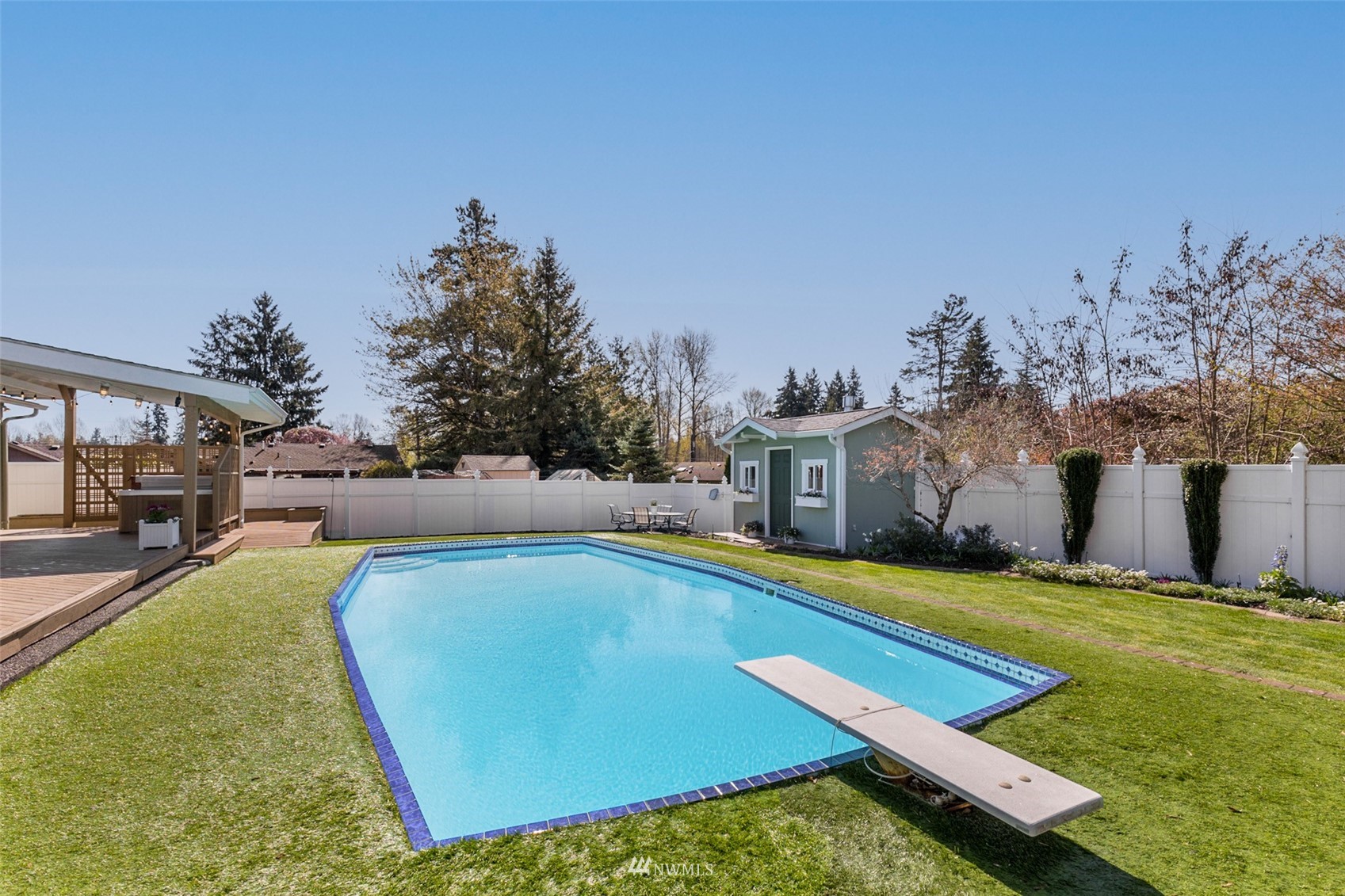 24204 Lockwood Road Bothell, WA 98021 - Photo 29 of 40 a view of a house with swimming pool and yard