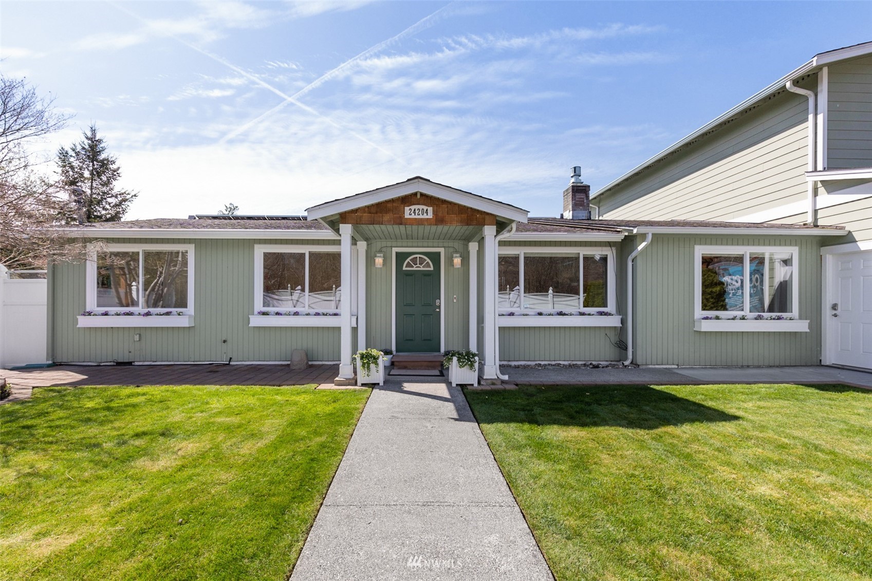 24204 Lockwood Road Bothell, WA 98021 - Photo 6 of 40 a front view of house with yard and green space