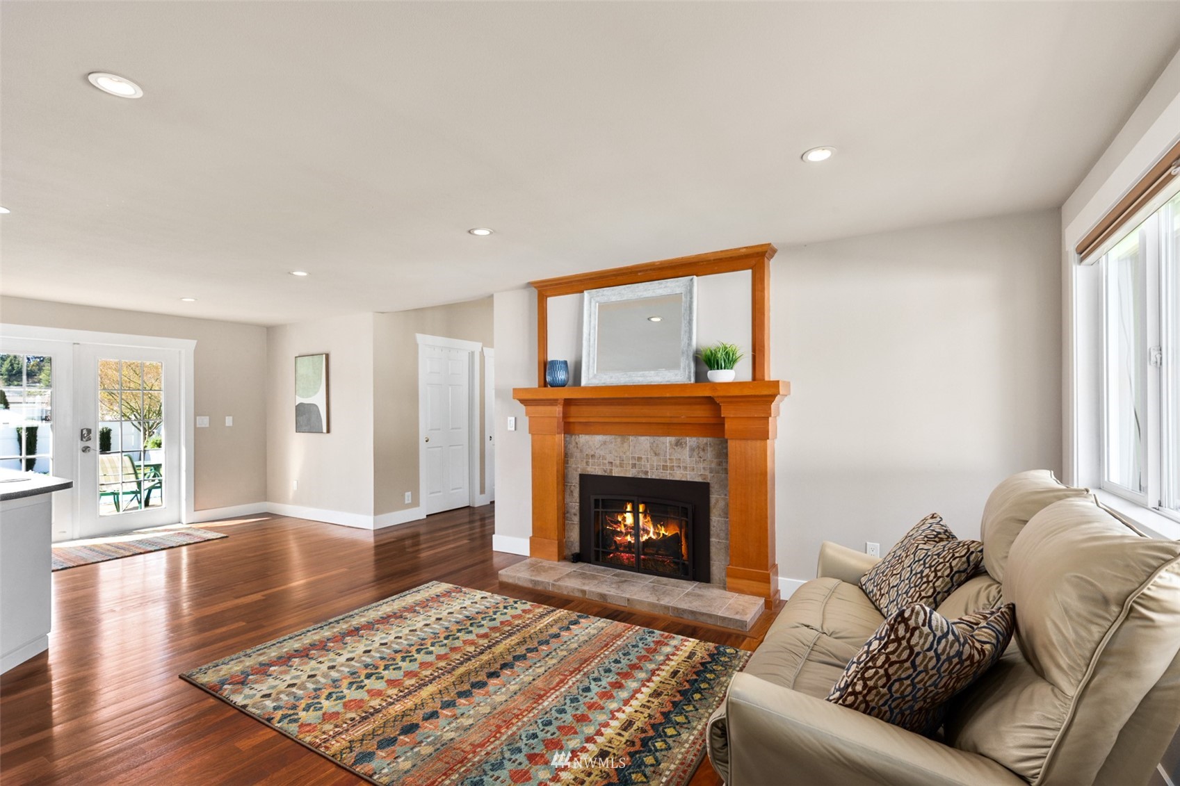 24204 Lockwood Road Bothell, WA 98021 - Photo 7 of 40 a living room with furniture and a fireplace