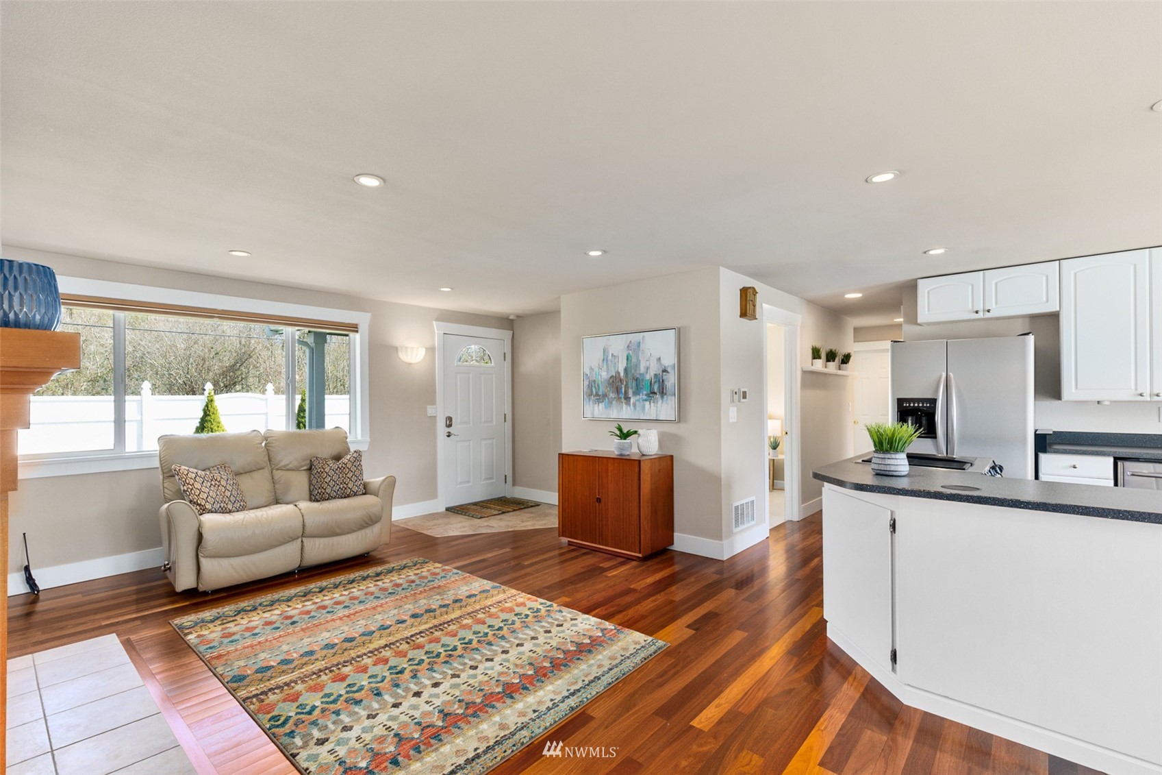 24204 Lockwood Road Bothell, WA 98021 - Photo 9 of 40 a living room with furniture and a rug
