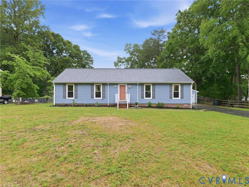 7707 Woodbrook Road Quinton, VA 23141 - Photo 2 of 42 Light blue siding exterior with a dark gray shingl