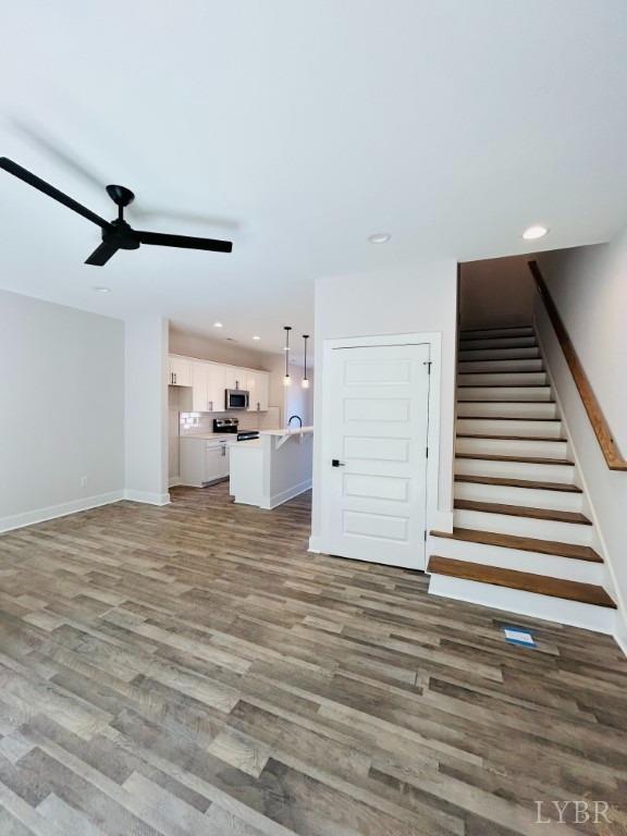 73 Allure Drive Rustburg, VA 24588 - Photo 7 of 13 a view of a room with wooden floor and staircase