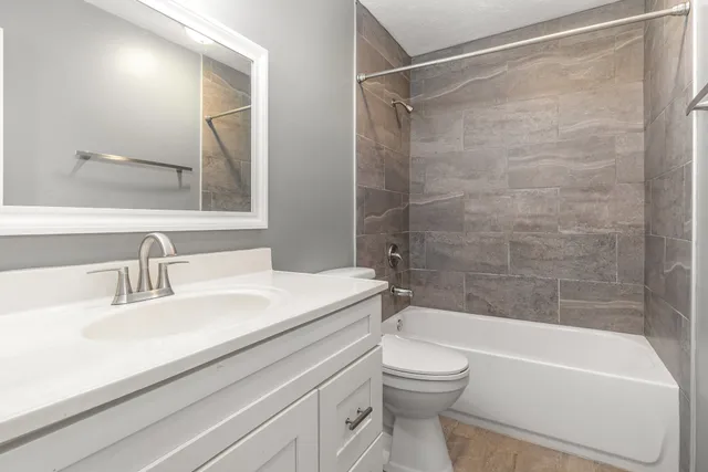 a view of a balcony with wooden fence