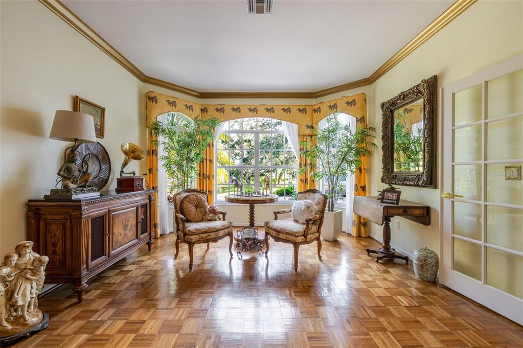 13881 Blenheim Trail Road Fort Myers, FL 33908 - Photo 11 of 82 a living room with furniture and a floor to ceiling window