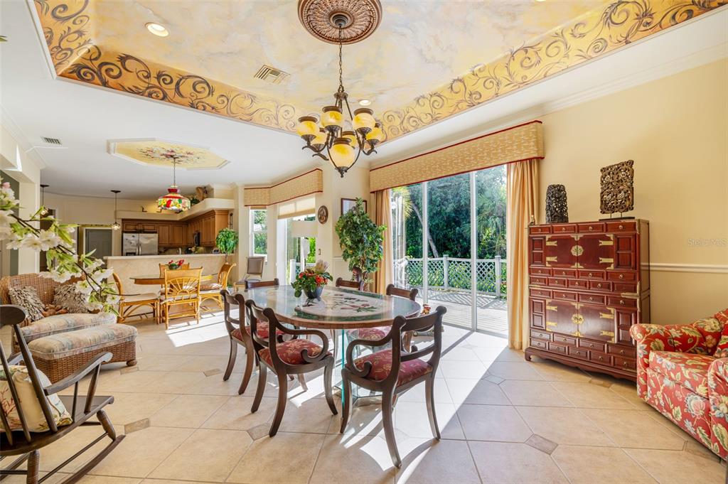13881 Blenheim Trail Road Fort Myers, FL 33908 - Photo 25 of 82 a view of a dining room with furniture window and outside view