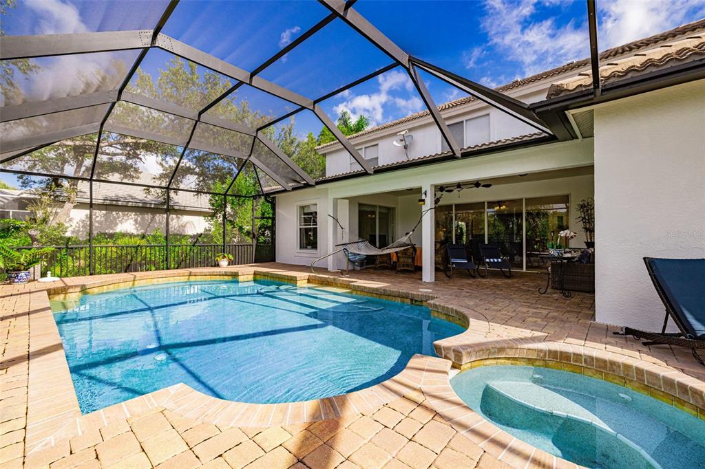 13881 Blenheim Trail Road Fort Myers, FL 33908 - Photo 60 of 82 a view of a white building with swimming pool in front of it