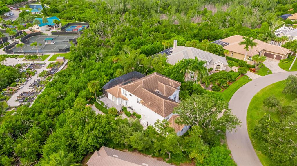 13881 Blenheim Trail Road Fort Myers, FL 33908 - Photo 71 of 82 an aerial view of a house with a garden