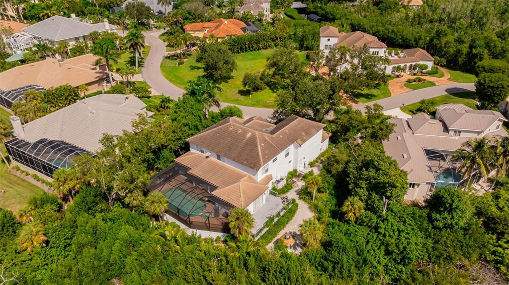 13881 Blenheim Trail Road Fort Myers, FL 33908 - Photo 76 of 82 an aerial view of multiple houses with yard