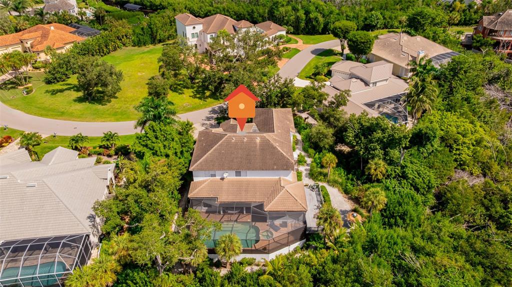 13881 Blenheim Trail Road Fort Myers, FL 33908 - Photo 77 of 82 an aerial view of a house with a garden