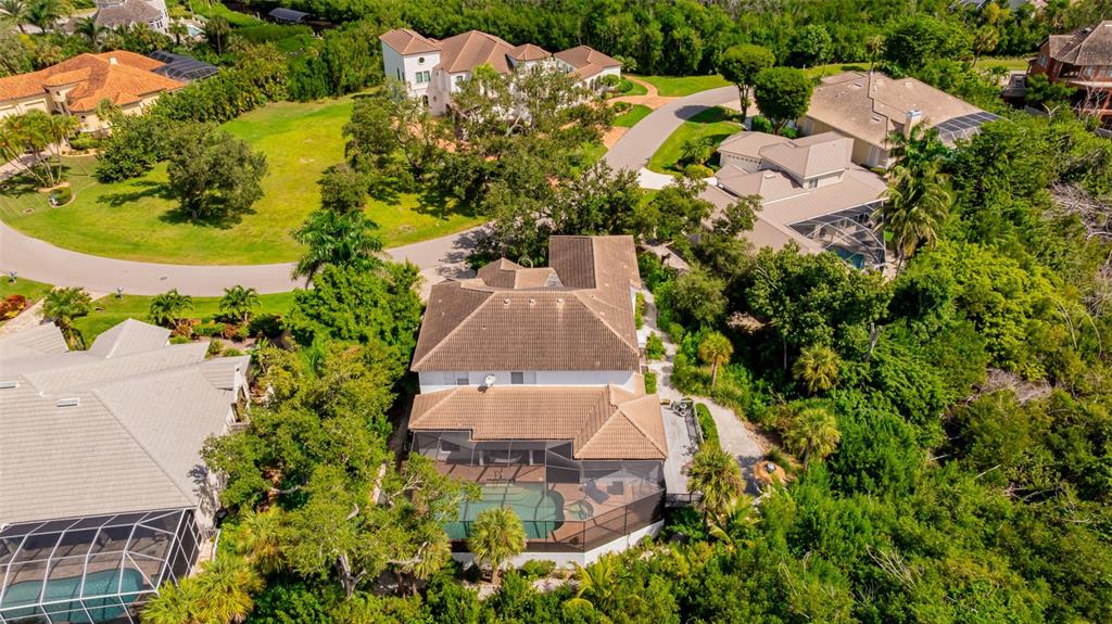 13881 Blenheim Trail Road Fort Myers, FL 33908 - Photo 78 of 82 an aerial view of a house with a garden