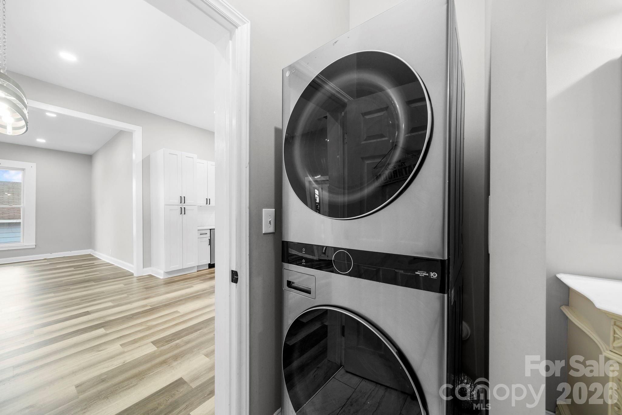 136 East Lacy Street Chester, SC 29706 - Photo 14 of 18 a view of a hallway with washer and dryer