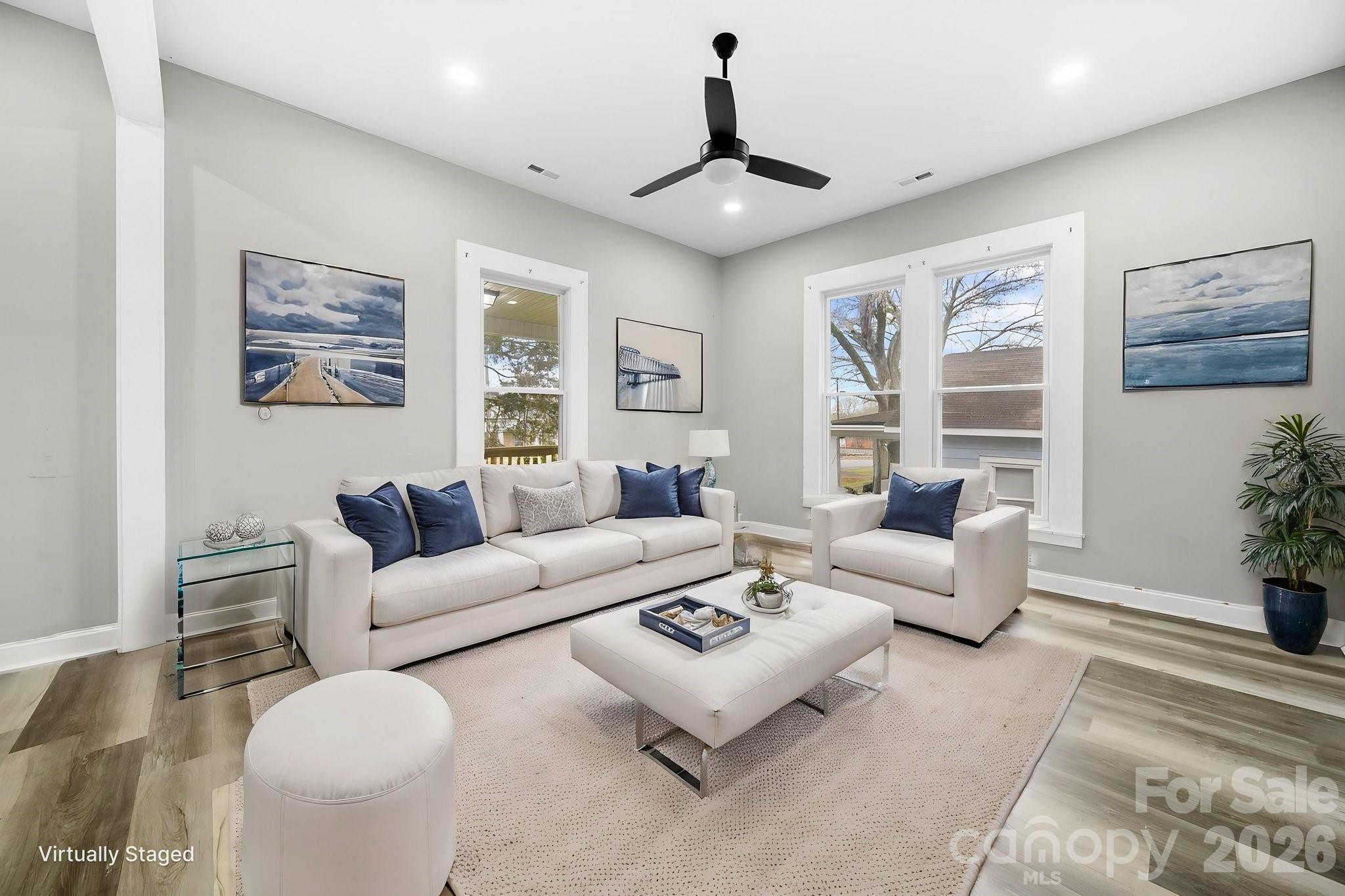 136 East Lacy Street Chester, SC 29706 - Photo 4 of 18 a living room with furniture and a large window