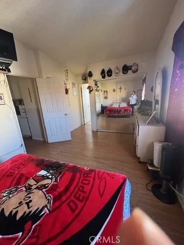 a living room with furniture and flat screen tv