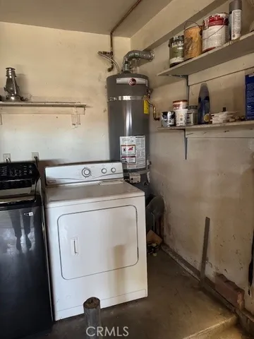 a view of an empty room with cabinet