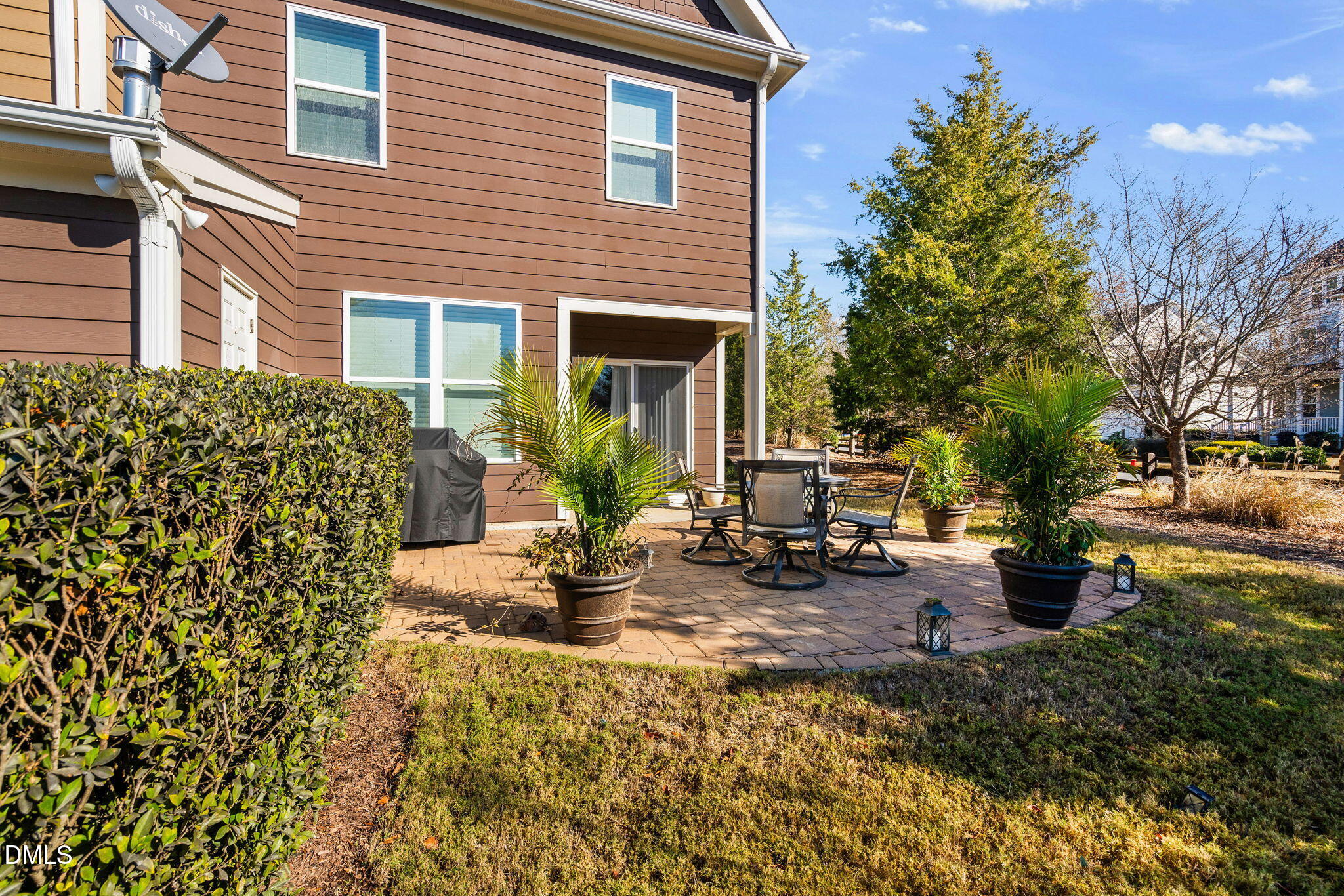 107 Ransomwood Drive Apex, NC 27539 - Photo 39 of 42 a view of a house with backyard and sitting area