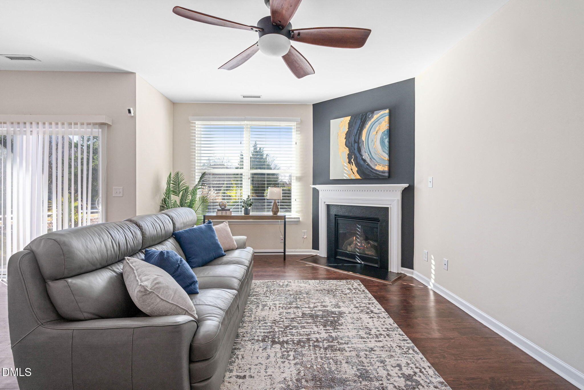 107 Ransomwood Drive Apex, NC 27539 - Photo 3 of 42 a living room with furniture fireplace and window
