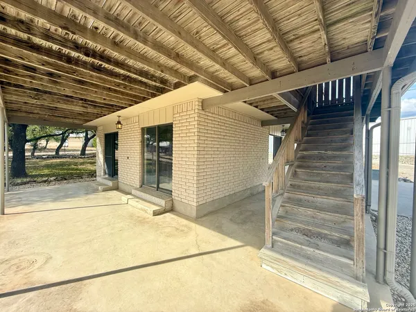 a balcony with wooden floor