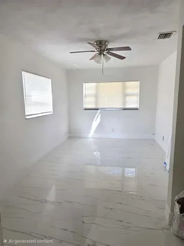 a view of a room that has a window in it