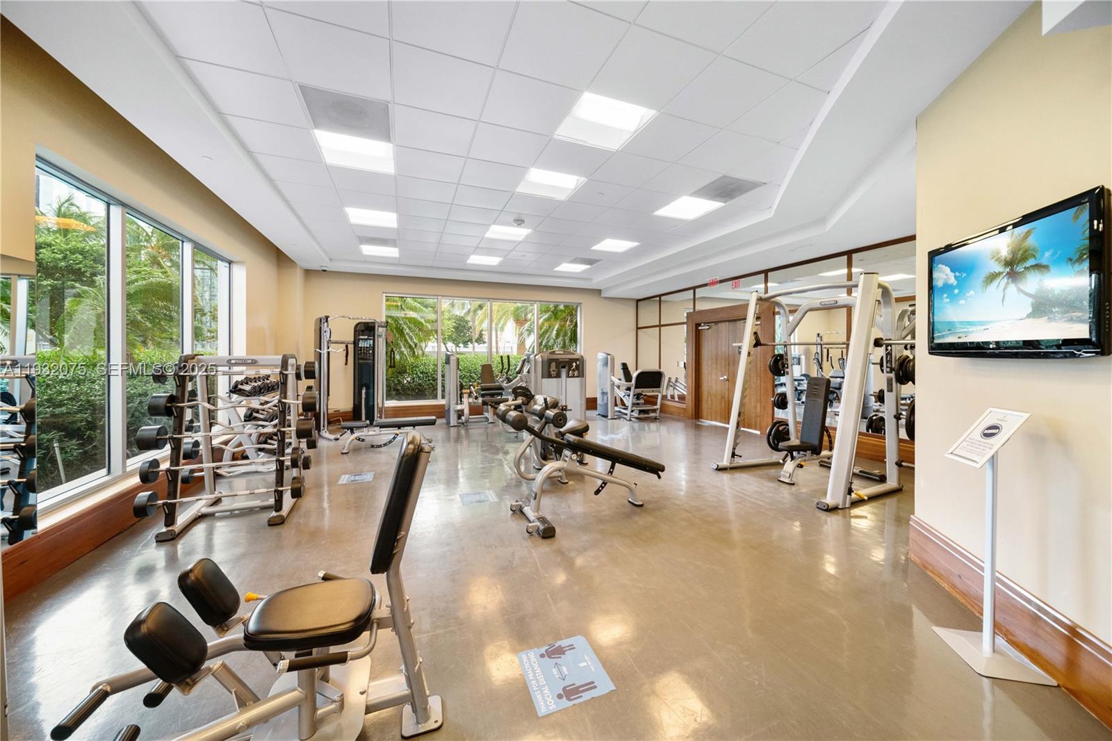 1050 Brickell Avenue, Unit 3122 Miami, FL 33131 - Photo 24 of 31 a view of a room with gym equipment