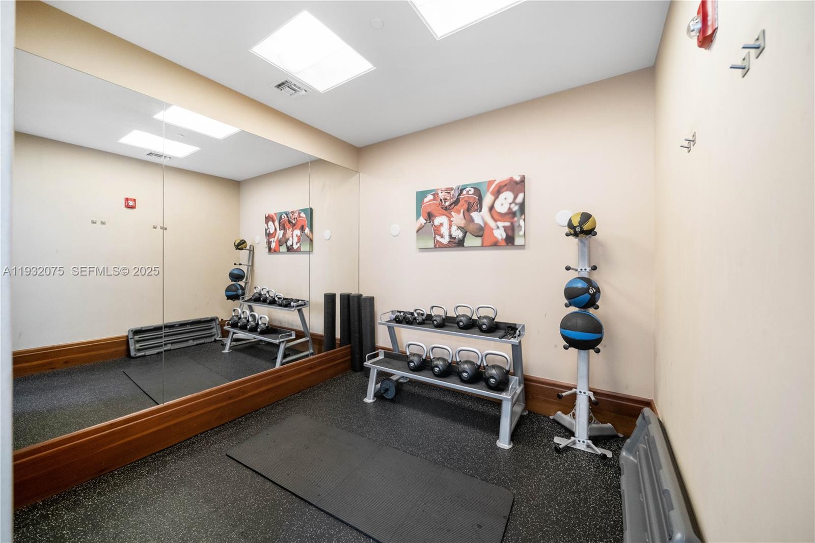 1050 Brickell Avenue, Unit 3122 Miami, FL 33131 - Photo 25 of 31 a view of a room with gym equipment