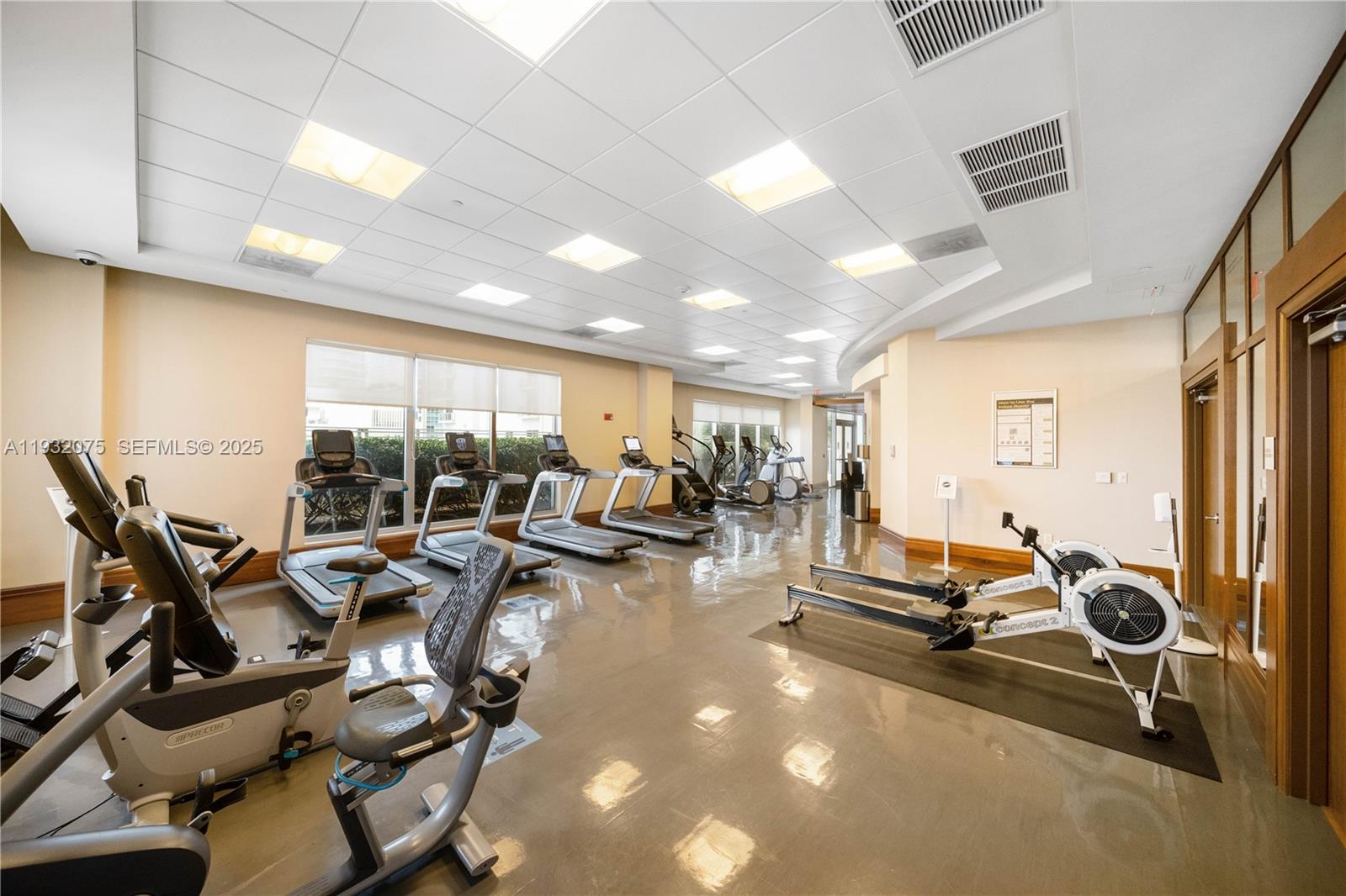 1050 Brickell Avenue, Unit 3122 Miami, FL 33131 - Photo 26 of 31 a view of a room with gym equipment